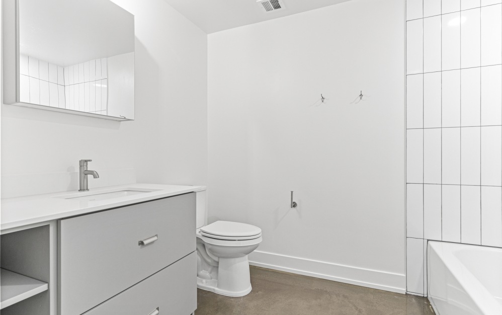 bathroom with a tub