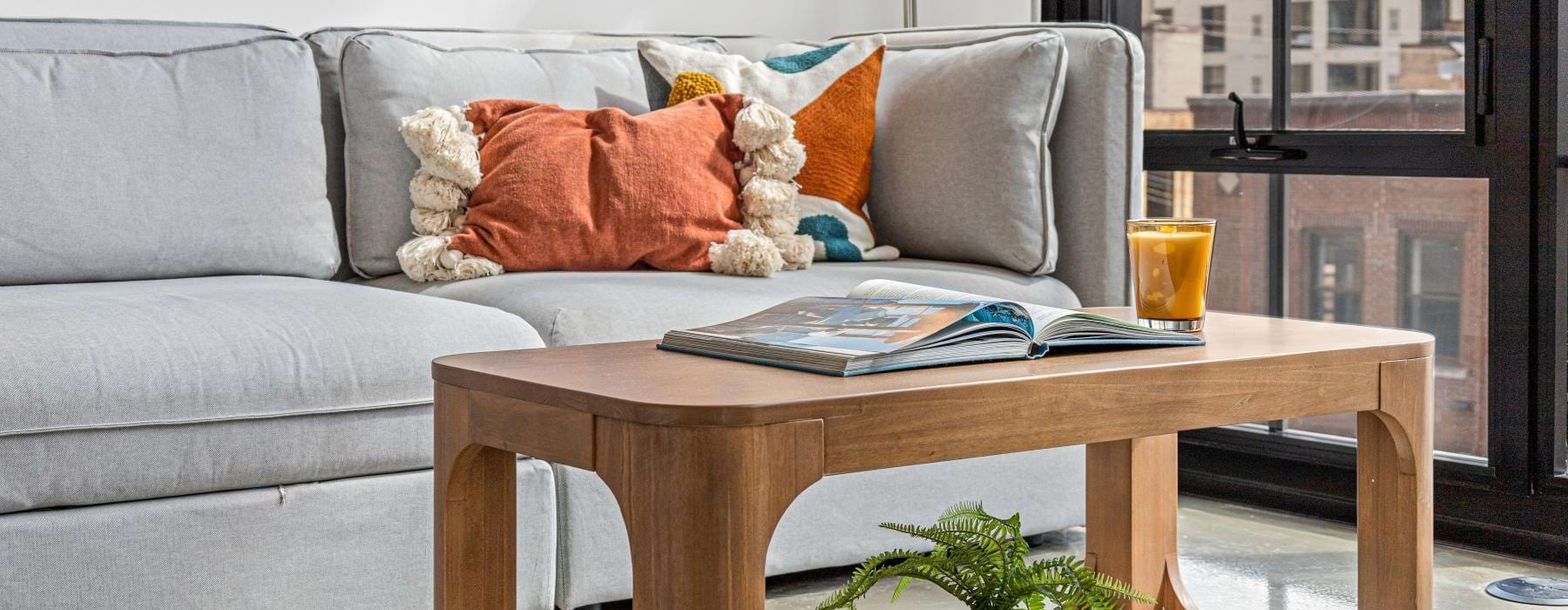 a couch with a coffee table and a coffee table