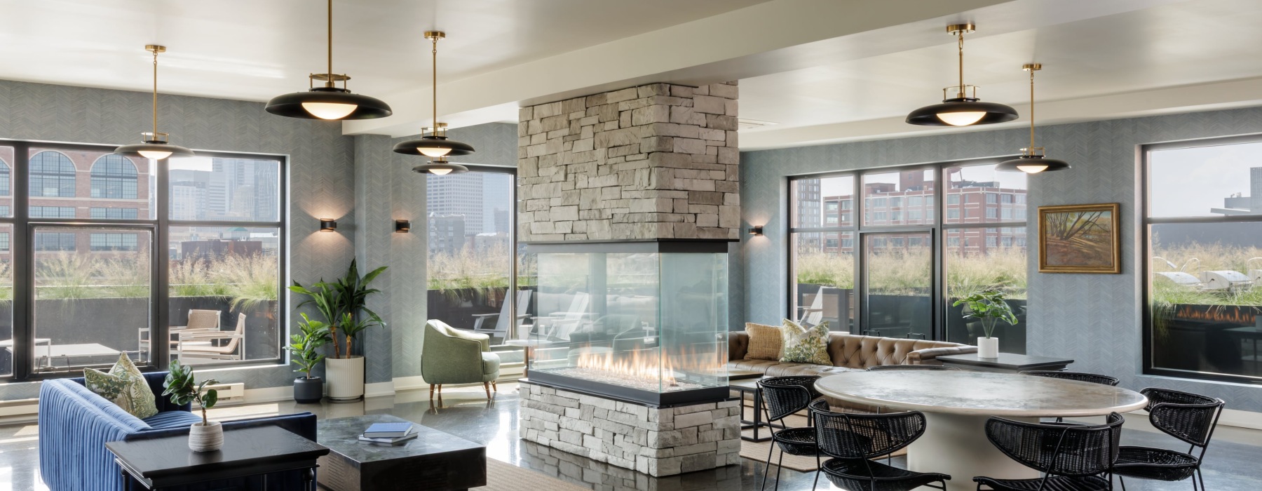 Lounge with Fireplace, Couch and Windows