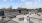 a group of tables and chairs on a rooftop